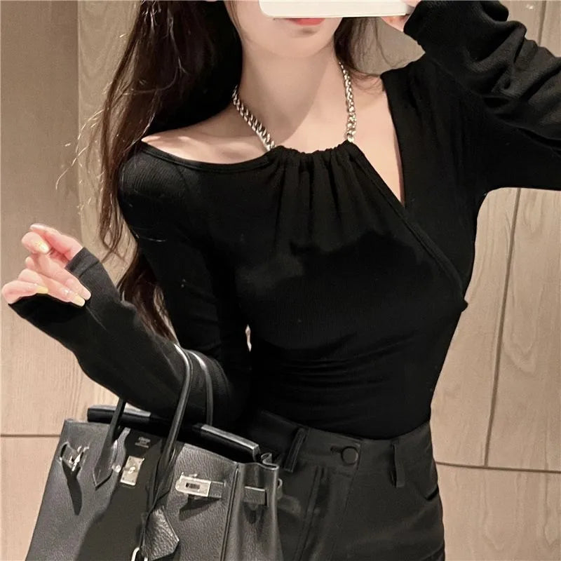 Women's Elegant Off-Shoulder Black Long Sleeve Top with Chain Neck Detail – Chic Slim Fit Fashion Blouse"